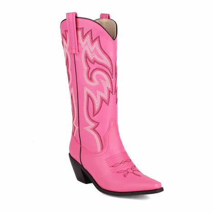 Colorful embroidered cowgirl boots in pink with intricate design and classic western style