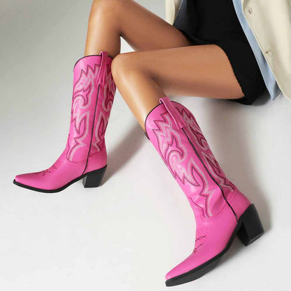 Stylish pink colorful embroidered cowgirl boots with intricate designs, perfect for trendy outfits