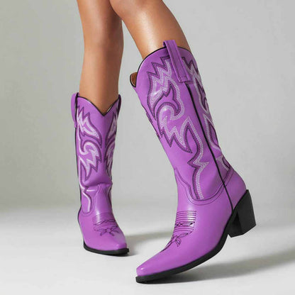 Colorful embroidered cowgirl boots in purple featuring stylish stitching and a classic western design