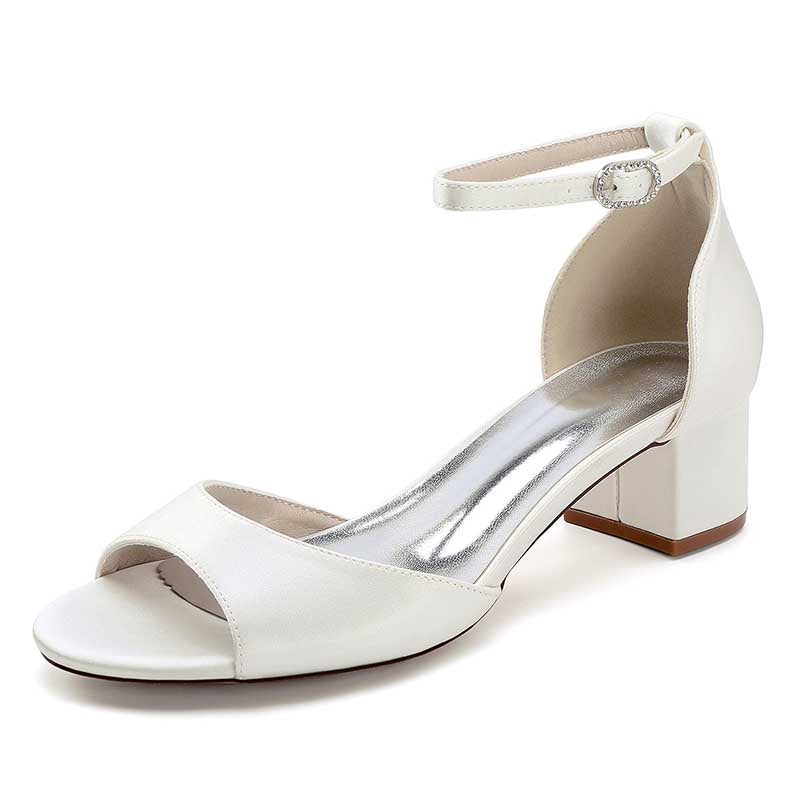 Elegant white comfortable block heel wedding sandals with ankle strap for stylish bridal wear