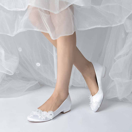 Elegant TC comfortable wedding flats for bride featuring floral embellishments in white satin