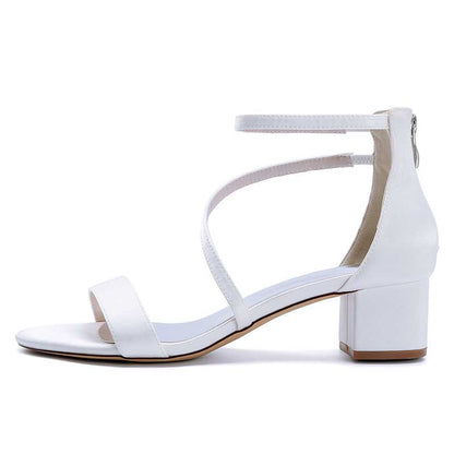 Stylish white comfortable wedding sandals with chunky heel featuring adjustable straps for a perfect fit