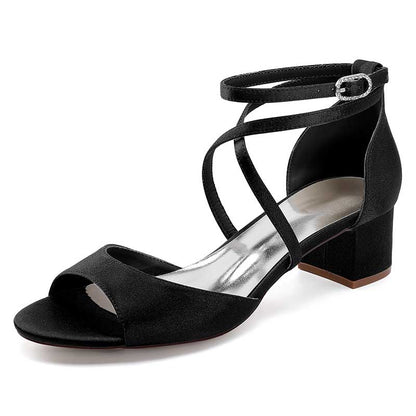 Elegant black criss cross satin block heel sandals with ankle strap for stylish comfort