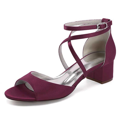Burgundy criss cross satin block heel sandals with ankle strap and open toe for stylish comfort