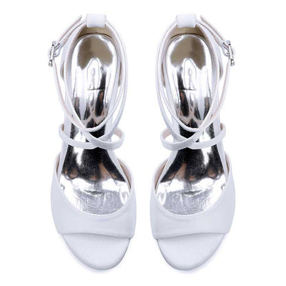 Elegant white criss cross satin block heel sandals with adjustable ankle straps for stylish comfort