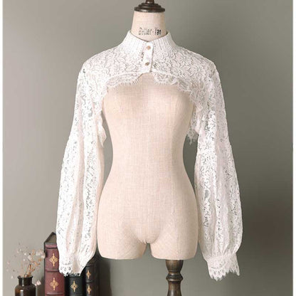Cropped lace half shirt with long sleeves featuring a button closure and elegant design
