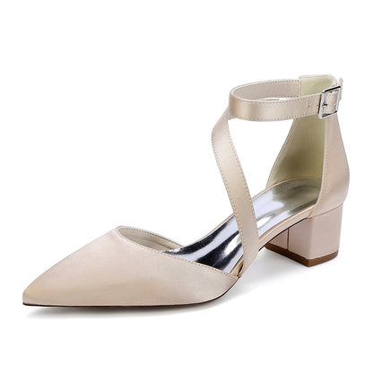 Elegant cross strap wedding shoes in beige with a pointed toe and a modest heel