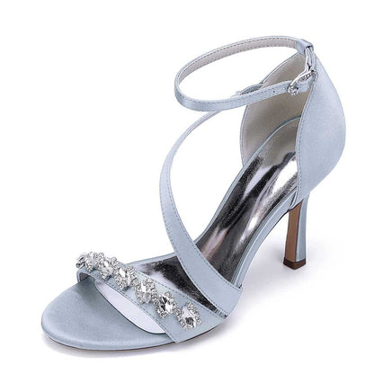 Elegant S&DCo. cross-strap wedding shoes for brides in soft blue with sparkling embellishments