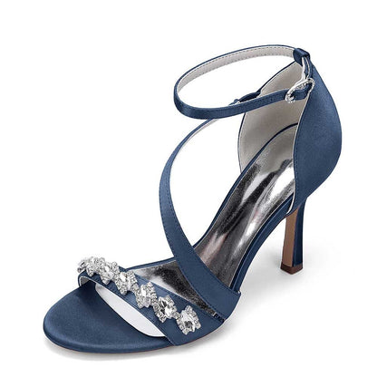 Elegant S&DCo. cross-strap wedding shoes for brides in navy blue with decorative rhinestones