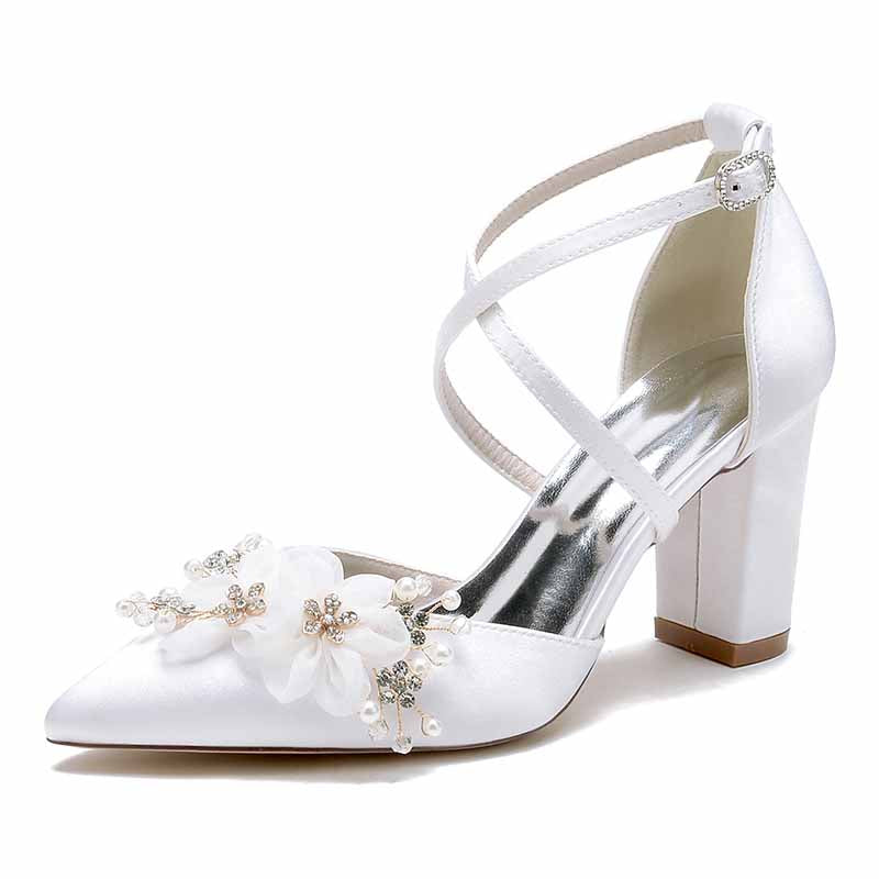Elegant S&DCo. cross strap wedding shoes for women with floral embellishments and a chunky heel