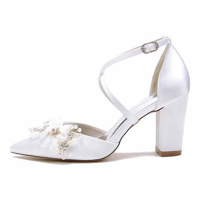 Elegant S&DCo. cross strap wedding shoes for women with floral embellishments and a stylish heel
