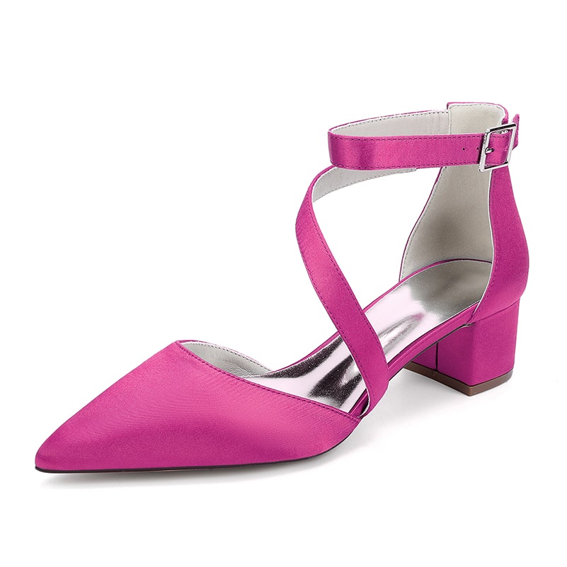 Pink cross strap wedding shoes with a pointed toe and block heel for stylish bridal attire