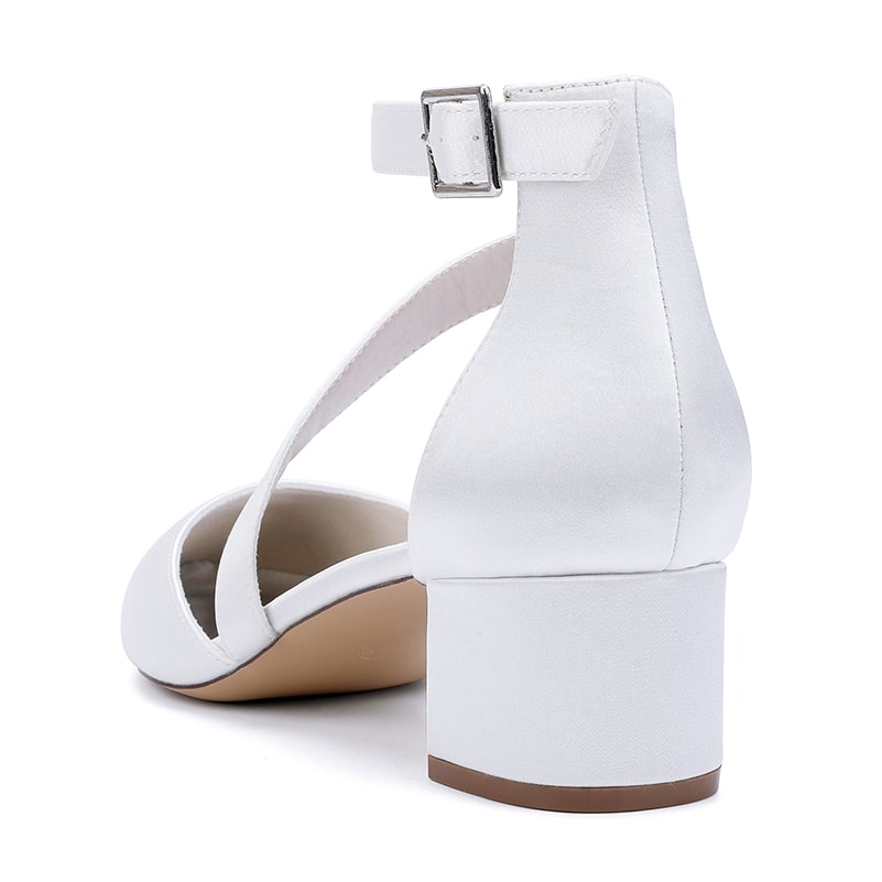 Elegant white cross strap wedding shoes with low block heels and adjustable ankle strap