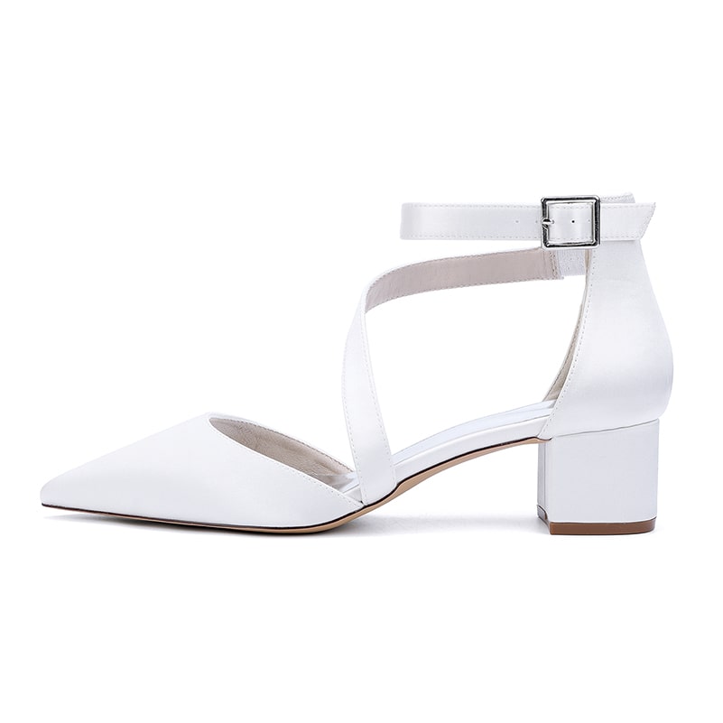 Elegant white cross strap wedding shoes with a block heel designed for bridal comfort and style