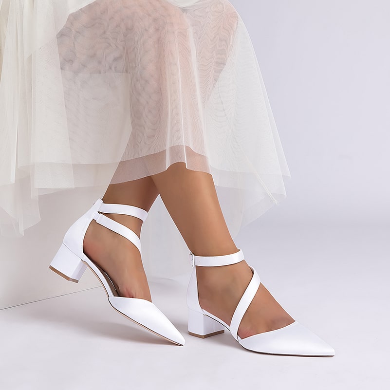 Elegant cross strap wedding shoes in white with block heels for a stylish bridal look