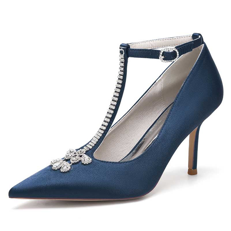 Elegant navy blue crystal ankle strap wedding heels with a pointed toe and decorative embellishments