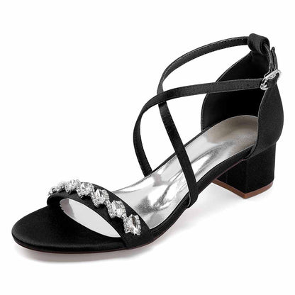 Elegant black crystal chunky heel dress sandals with a stylish cross-strap design