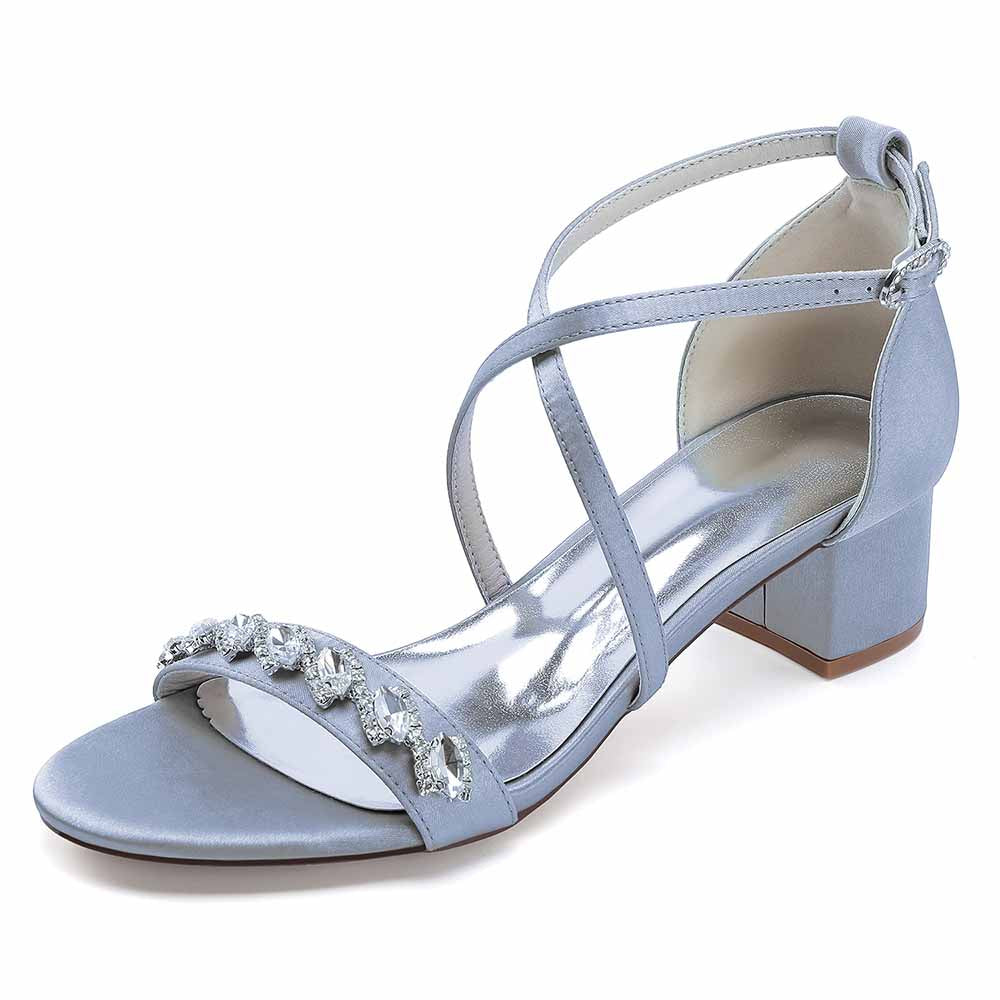 Light blue crystal chunky heel dress sandals with elegant strap design and embellished front