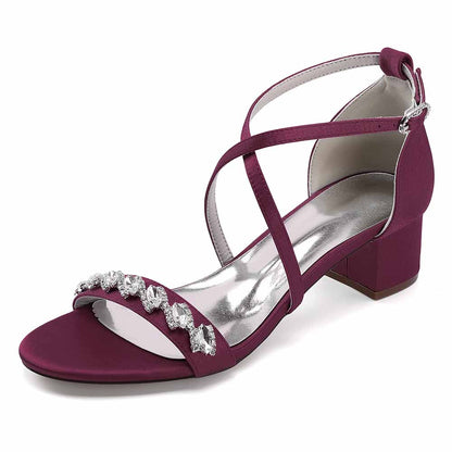 Elegant crystal chunky heel dress sandals in deep purple with stylish ankle straps and beaded embellishments