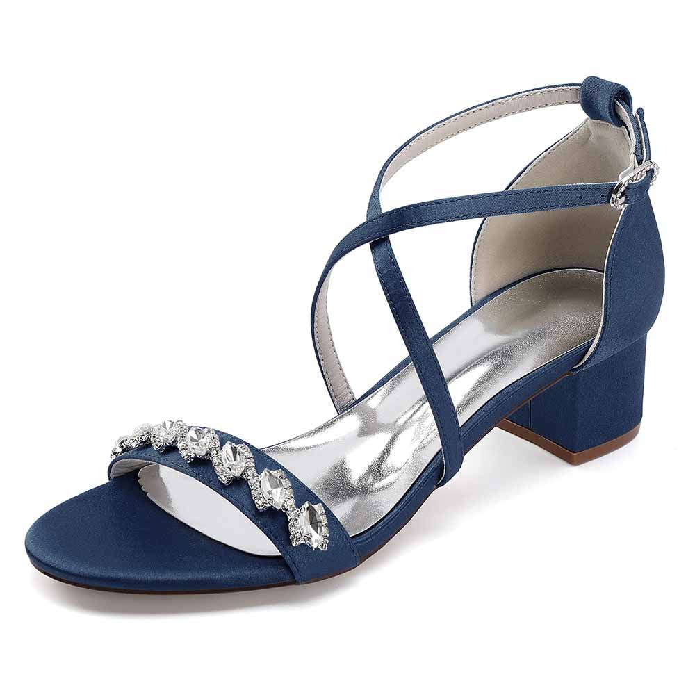 Navy blue crystal chunky heel dress sandals with crisscross straps and embellished detailing