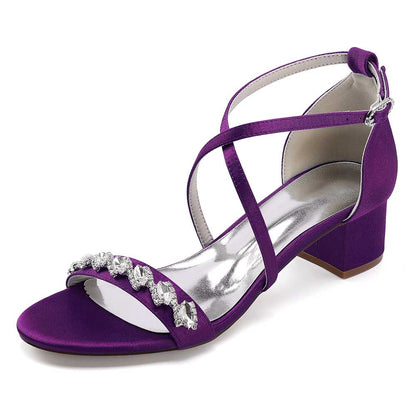 Purple crystal chunky heel dress sandals with pearl embellishments and stylish ankle straps