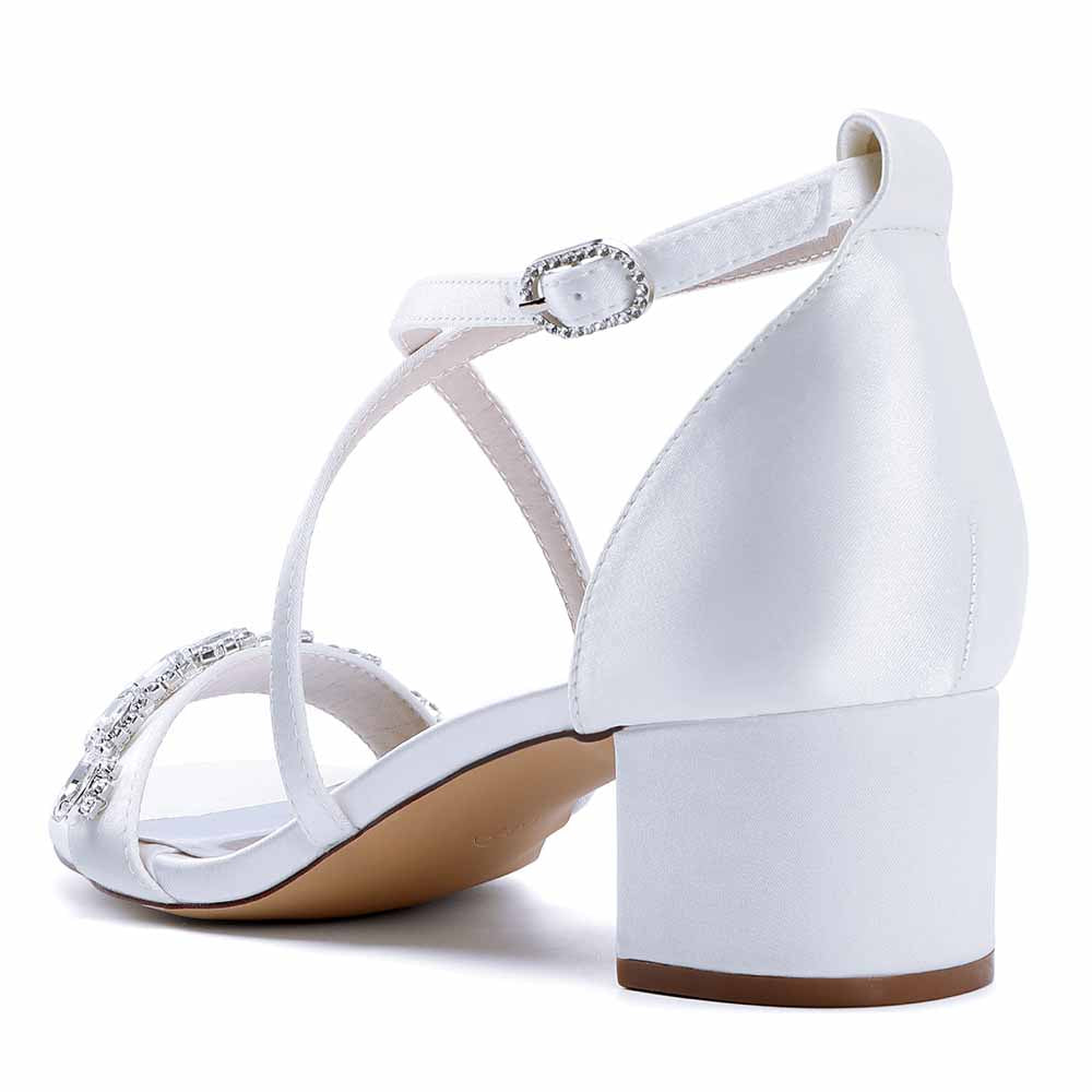 Elegant white crystal chunky heel dress sandals with a stylish strap design for special occasions