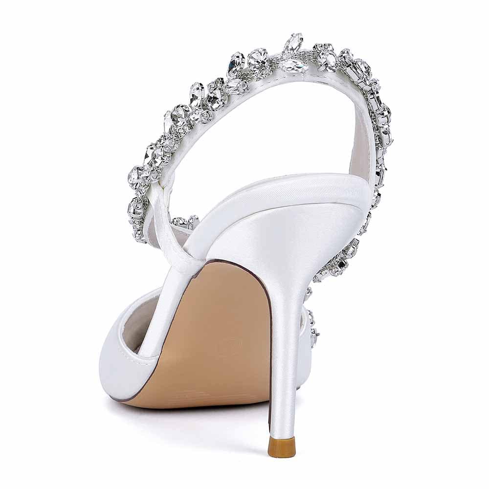 Elegant white crystal strap bridal heels with sparkling embellishments for a stunning wedding look