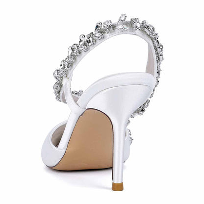 Elegant white crystal strap bridal heels with sparkling embellishments for a stunning wedding look