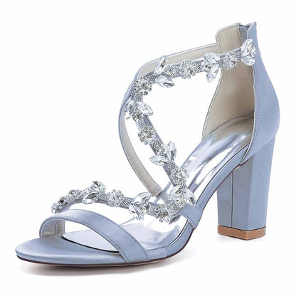 Elegant crystal strappy wedding heels in light blue with decorative crystal embellishments