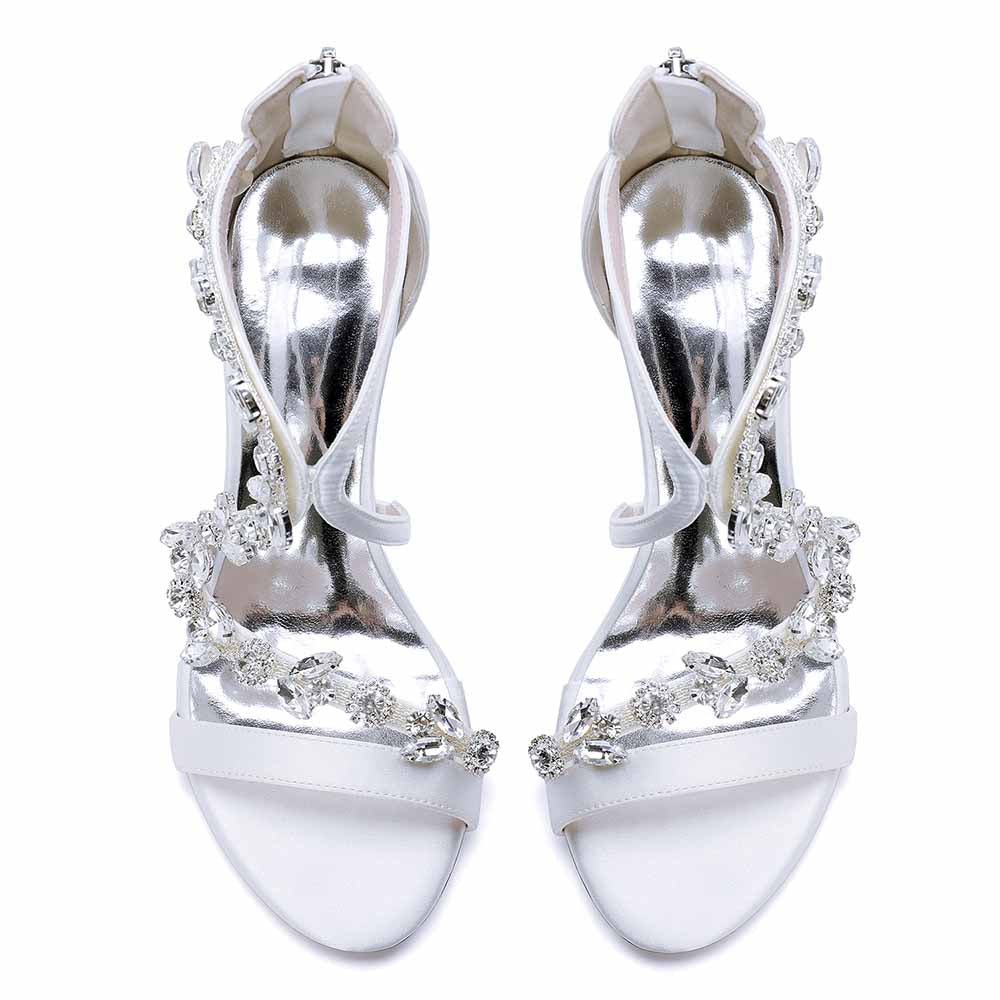 Elegant crystal strappy wedding heels with shimmering embellishments and a sleek design