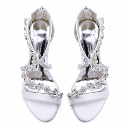 Elegant crystal strappy wedding heels with shimmering embellishments and a sleek design