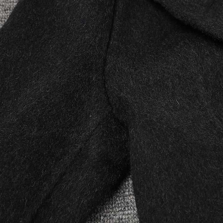 Elegant double belted wool coat black with a soft texture, perfect for winter layering