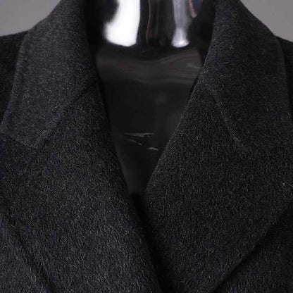 Elegant double belted wool coat black featuring a sleek collar and soft texture
