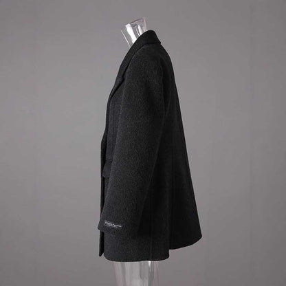 Double belted wool coat black with a stylish silhouette, perfect for chilly weather
