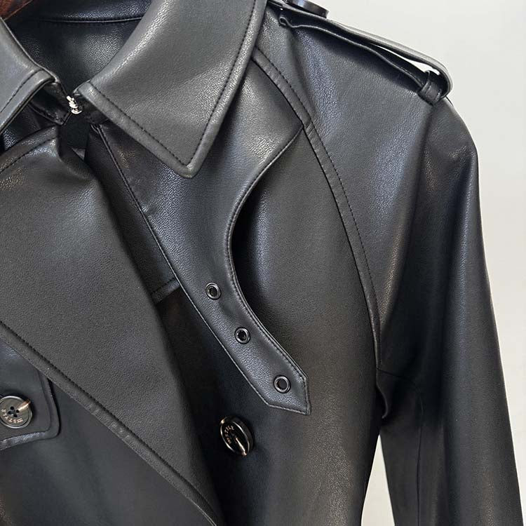 Stylish double breasted faux leather trench coat with a sleek collar and modern design