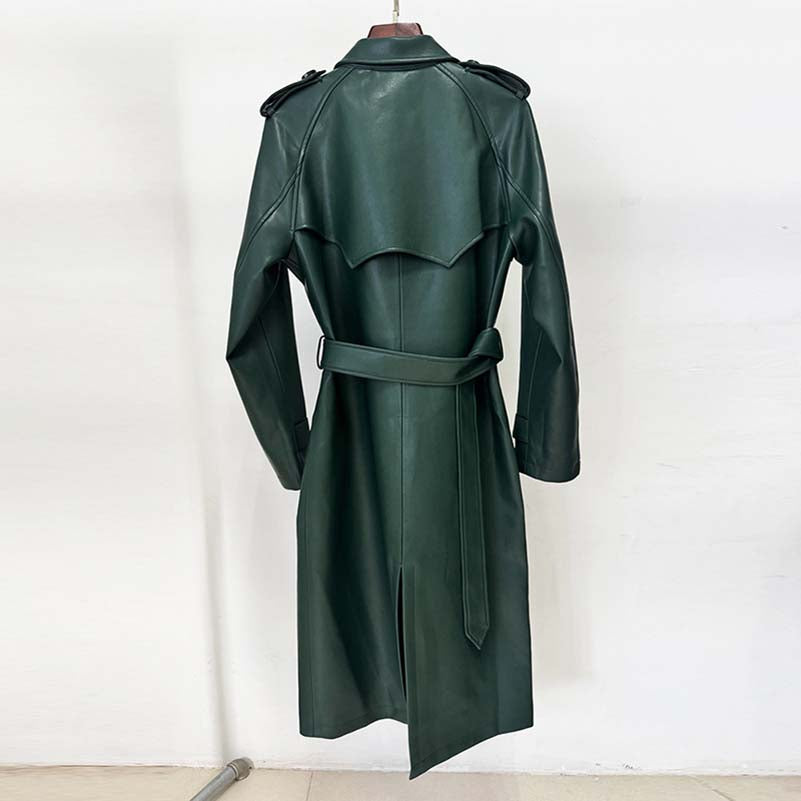Back view of a green double breasted faux leather trench coat with a belted waist and stylish design