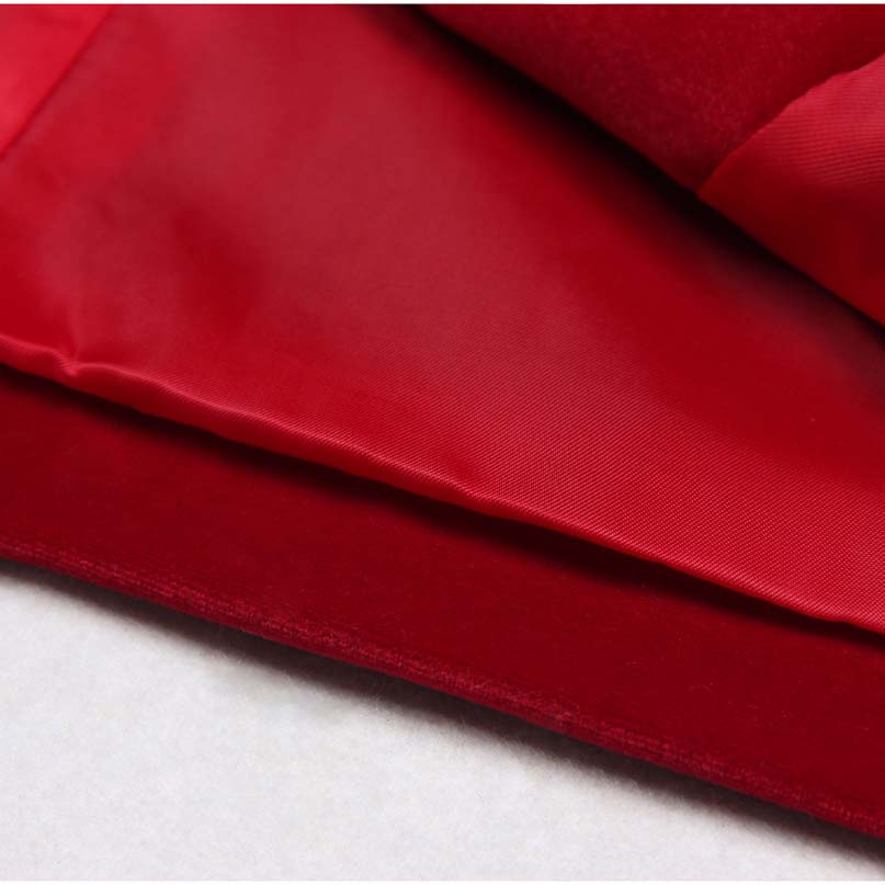 Close-up of rich red fabric showcasing a double breasted velvet pantsuit by SD Dresscode & Fashiontrends