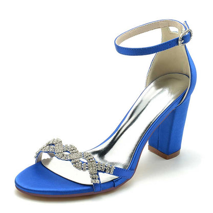 Elegant blue dressy block heel sandals for weddings with sparkling embellishments and ankle strap