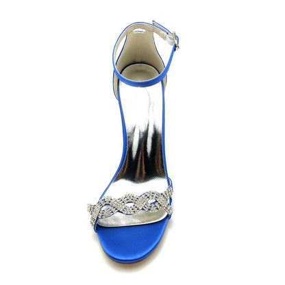 S&DCo. Blue dressy block heel sandals for weddings featuring an elegant rhinestone strap