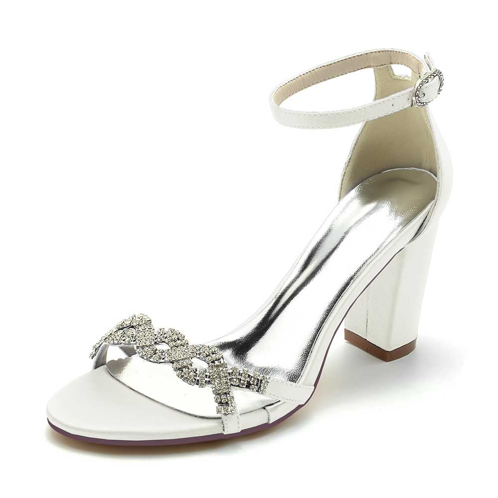 Elegant white dressy block heel sandals for weddings with sparkling embellishments and ankle strap