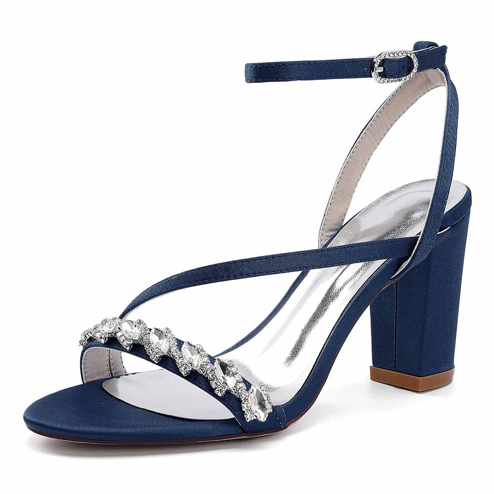 Elegant ankle strap dress shoes in navy with jeweled embellishments and a chic block heel