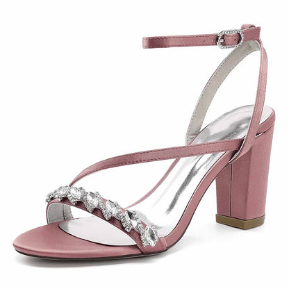 Elegant ankle strap dress shoes in pink with decorative rhinestone detailing and block heel
