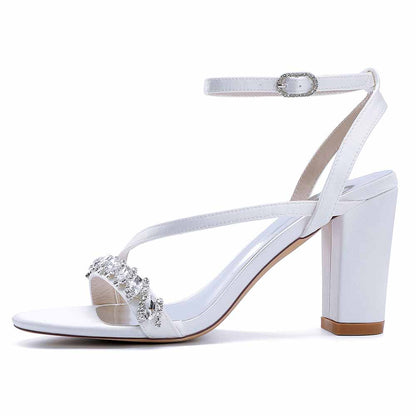 Elegant ankle strap dress shoes in white with rhinestone detailing and block heel for special occasions