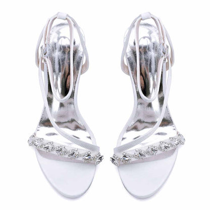Elegant ankle strap dress shoes in silver with embellished detail for formal occasions