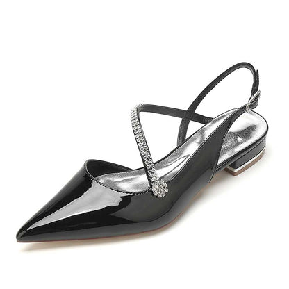 Elegant slingback flats for weddings in black patent leather with sparkling strap detail
