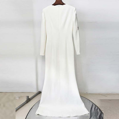 Elegant embellished evening gown for prom, featuring a sleek back design and long sleeves