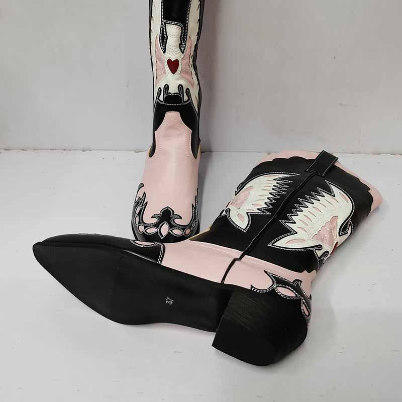 Embroidered western cowboy boots for women featuring a pink and black design with intricate stitching