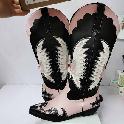 Embroidered western cowboy boots for women in black and pink with intricate designs and pointed toe