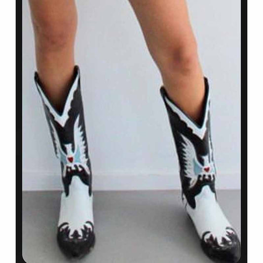 Embroidered western cowboy boots for women featuring intricate designs and tall shafts