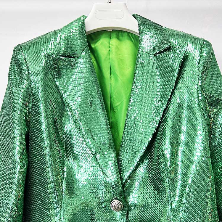 Emerald green sequin pantsuit for women with a stylish blazer and sparkling fabric detail